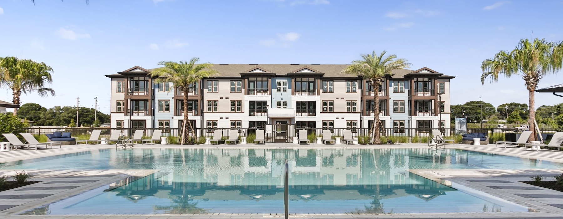 a pool in front of a building