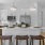 a kitchen with an island and seating