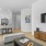 a living room with a tv and couches