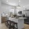 a kitchen with white cabinets